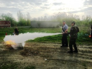 Cadet using Fire Extinguisher